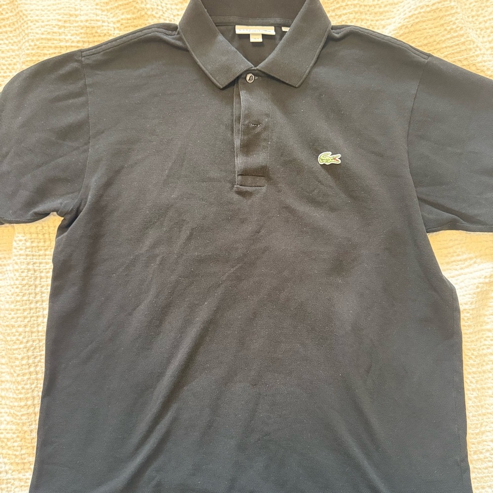 Lacoste Black Polo Shirt with Iconic Logo and Pique Texture